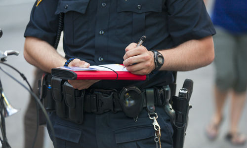 Police_writing_ticket_edited