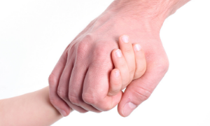 holding childs hand